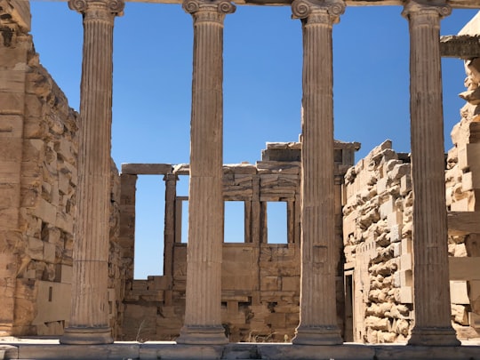 brown concrete pillar during daytime in Acropolis of Athens Greece