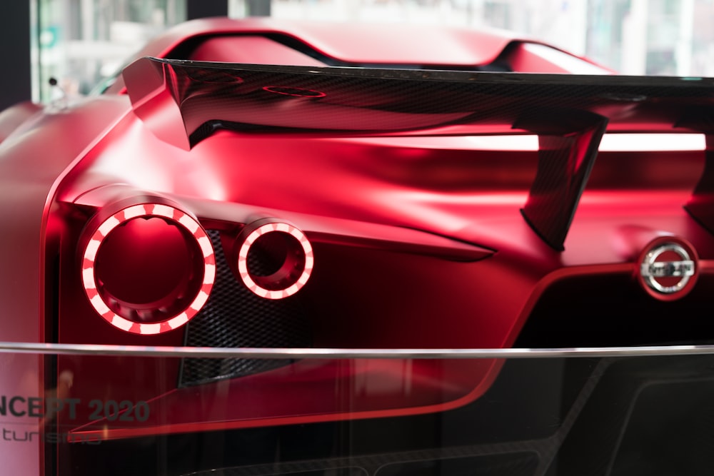 red and black car in a garage