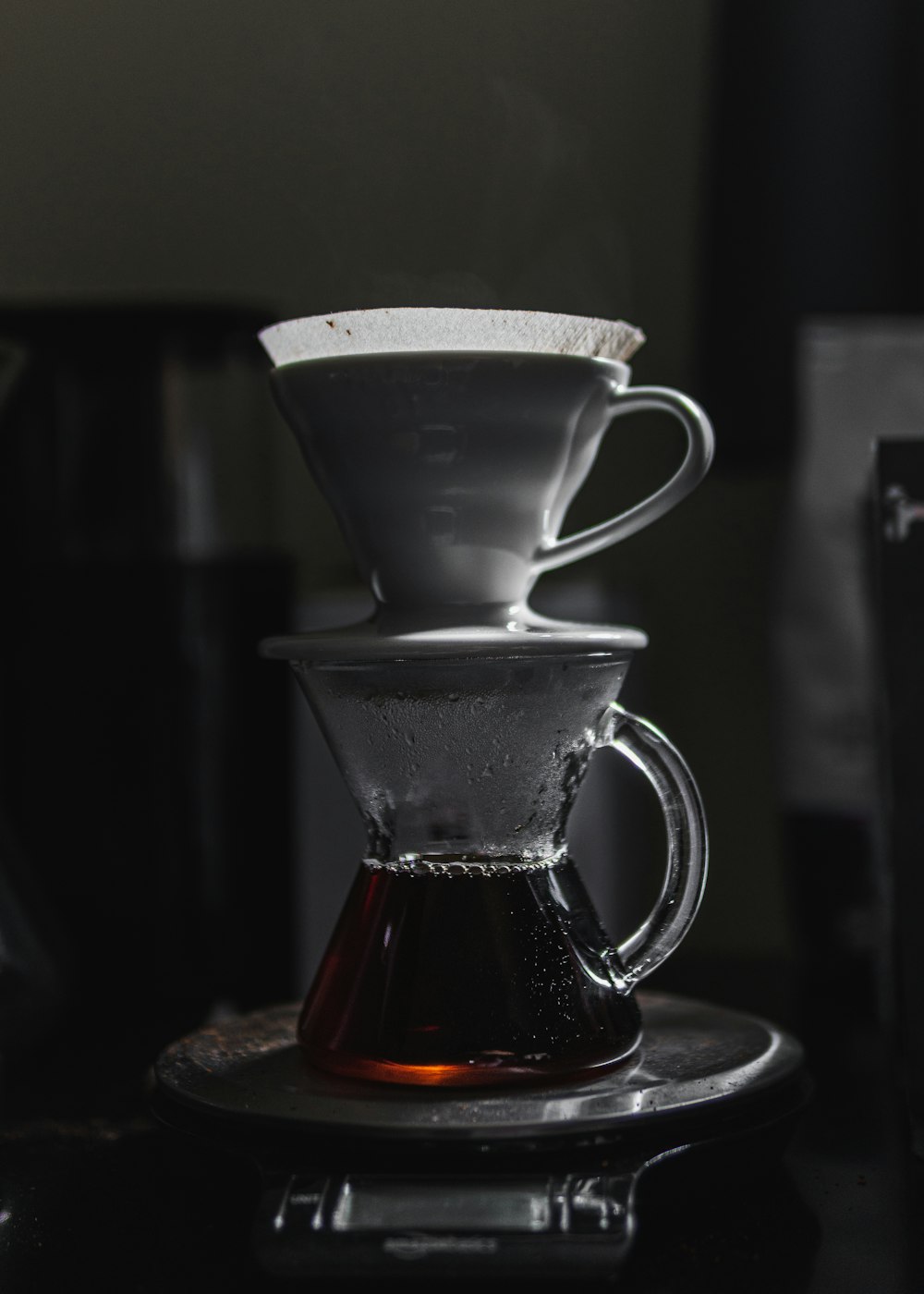 white ceramic teacup on saucer