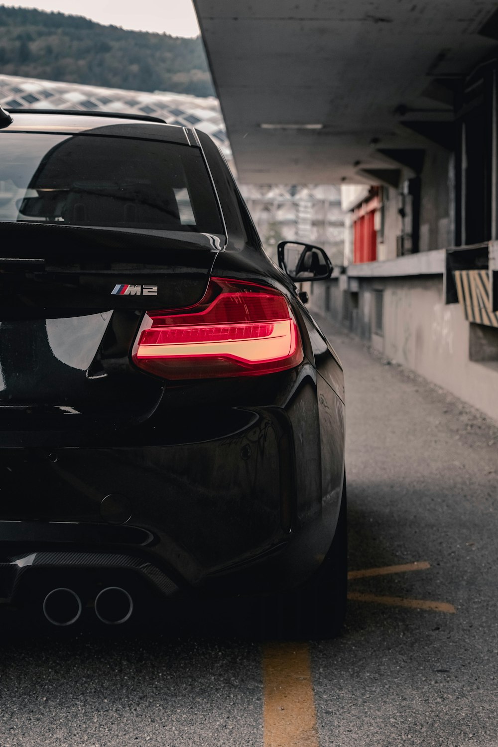 black car on road during daytime