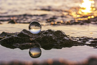 water drop on black rock