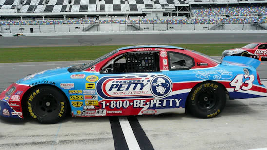 richard petty's blue and red racing car on track during daytime