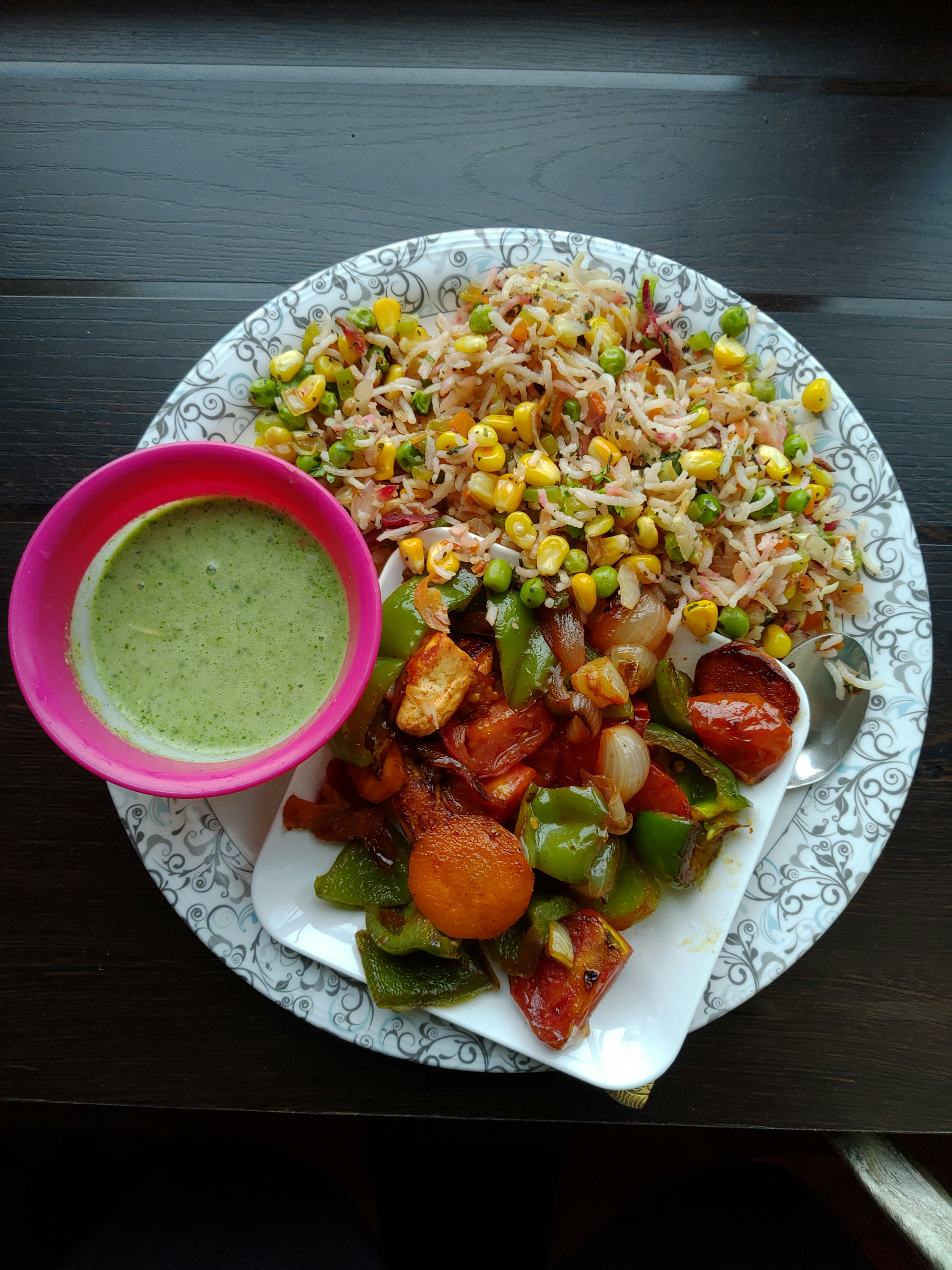 A vibrant plate of Kung Pao Chicken with colorful vegetables and peanuts