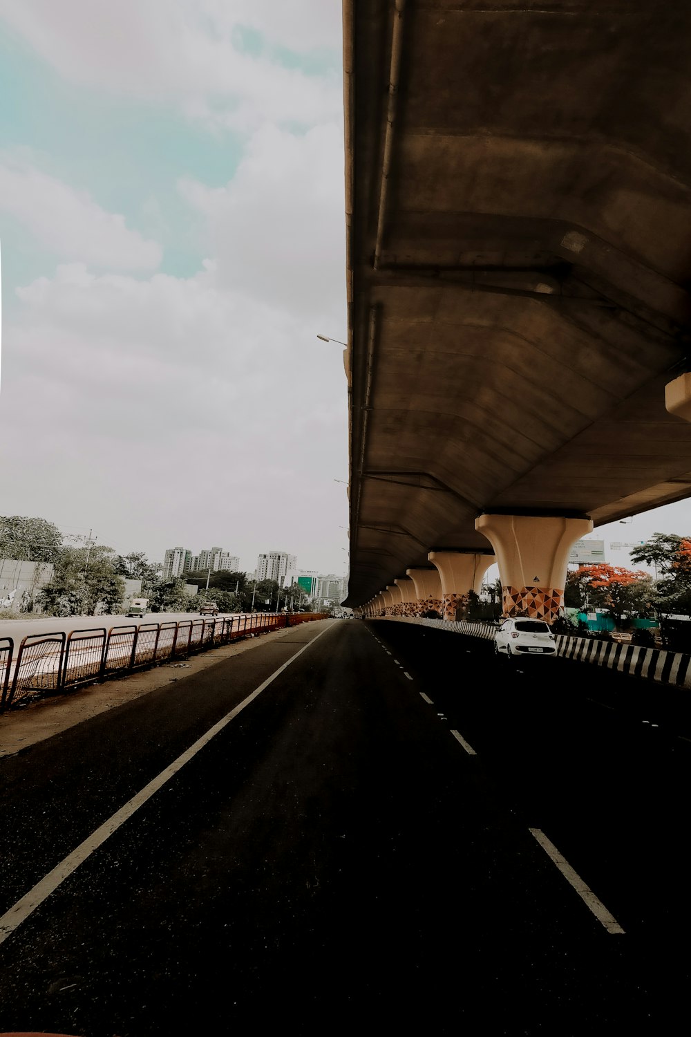 people walking on the bridge during daytime