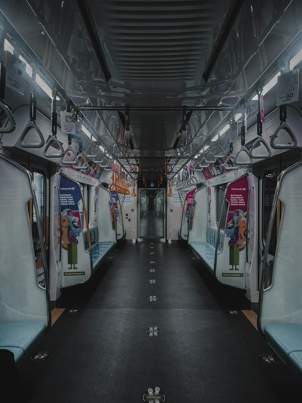 an empty subway car with no people on it