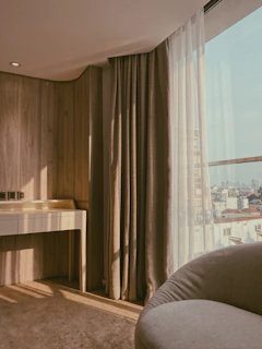 Soft morning light illuminating a serene skincare ritual on a cream-toned vanity