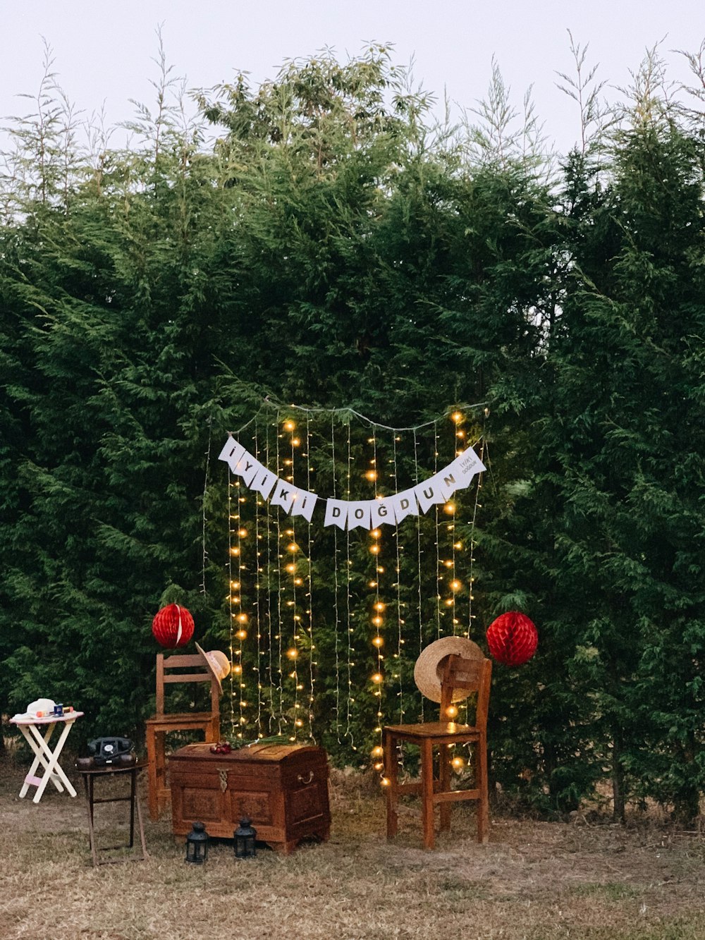 brown wooden hanging decor on green trees during daytime