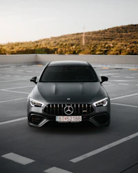 silver mercedes benz car on road during daytime