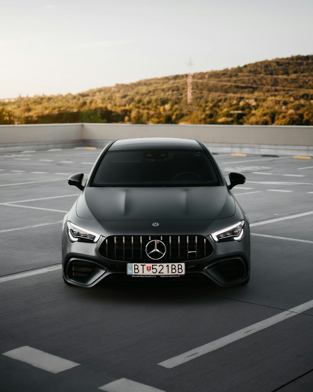 silver mercedes benz car on road during daytime