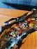 Close-up of a beautifully plated Asian fusion dish with vibrant colors and fresh ingredients.