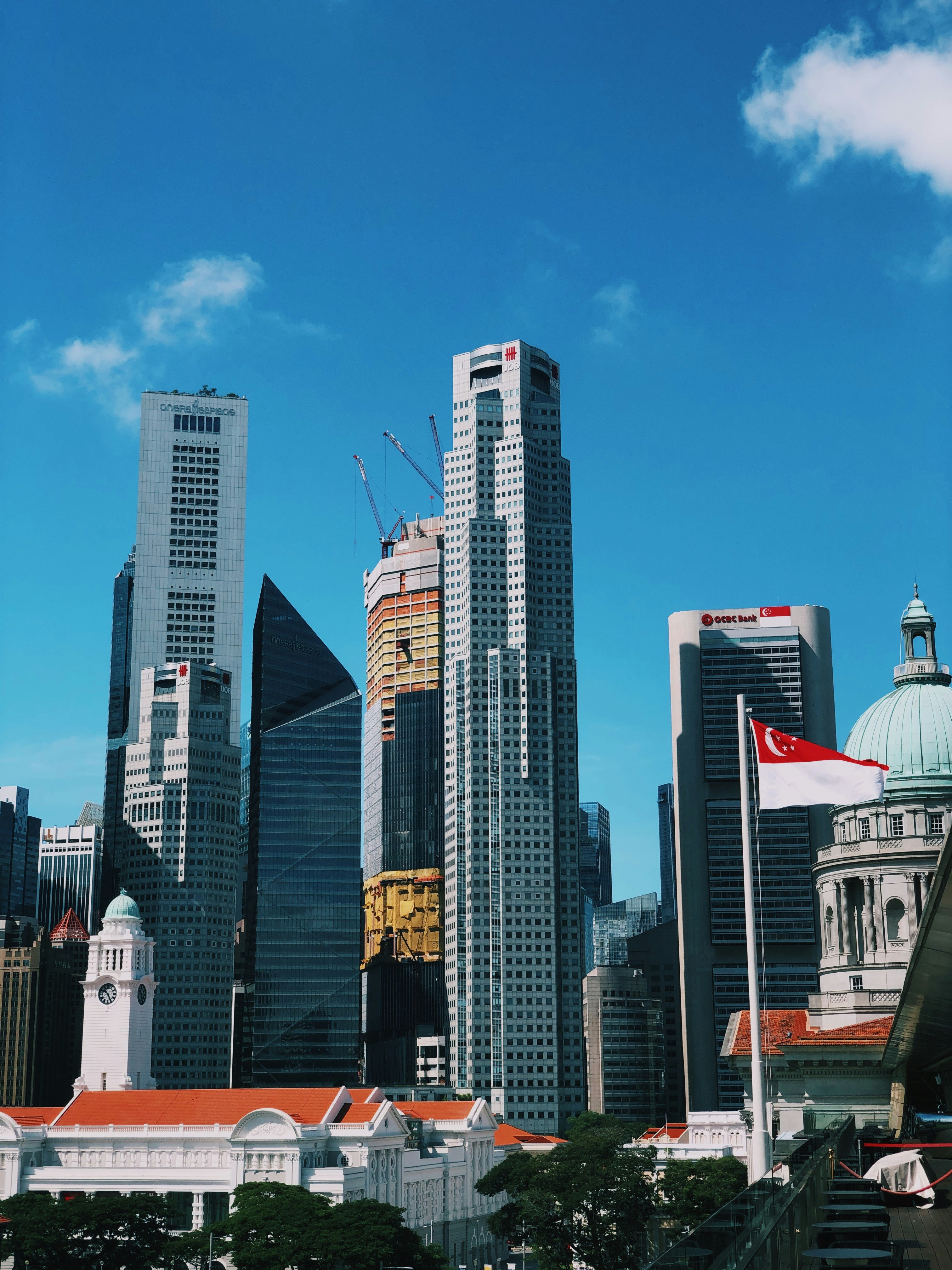 city buildings under blue sky during daytime