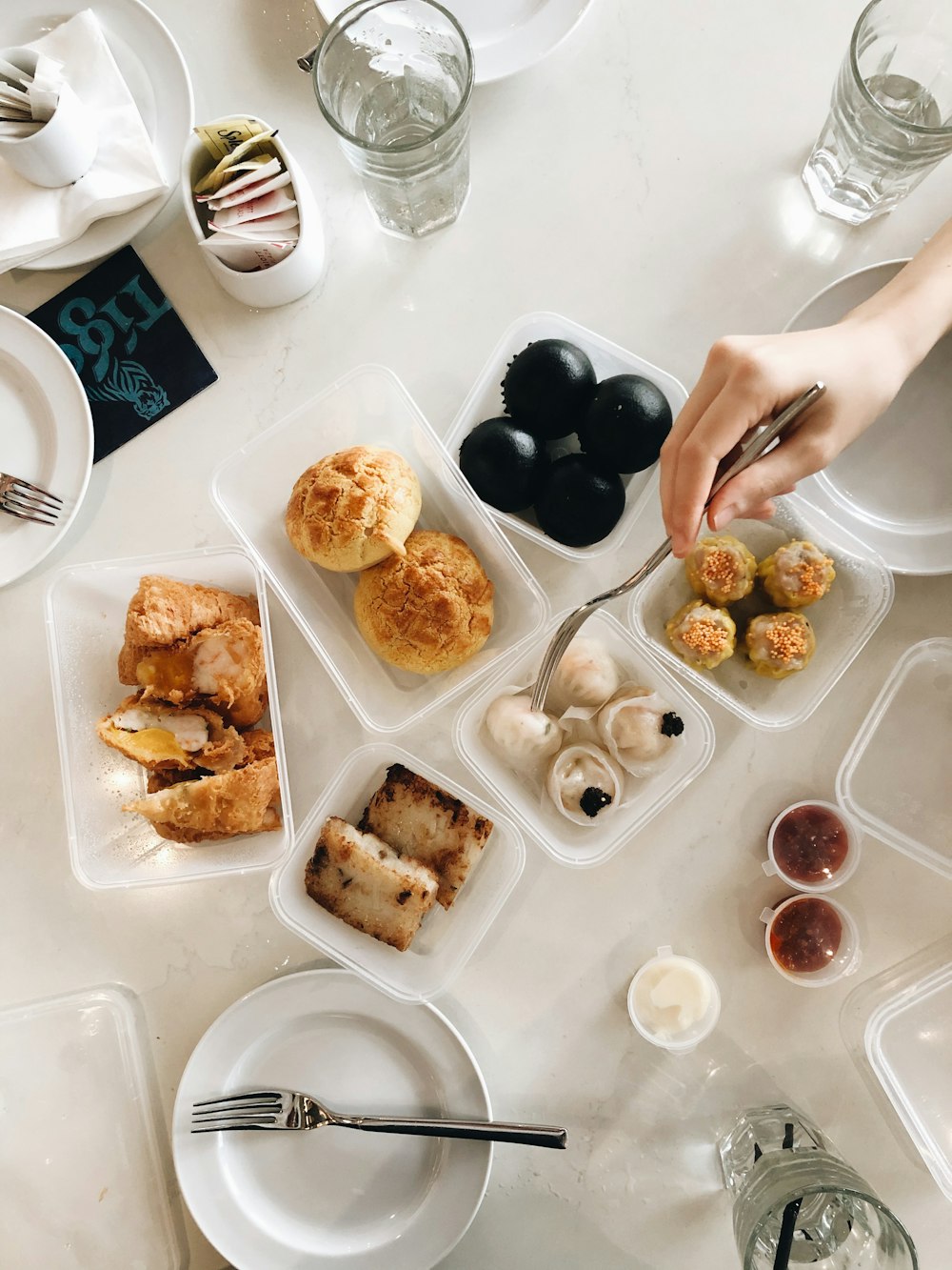 person holding tray of food