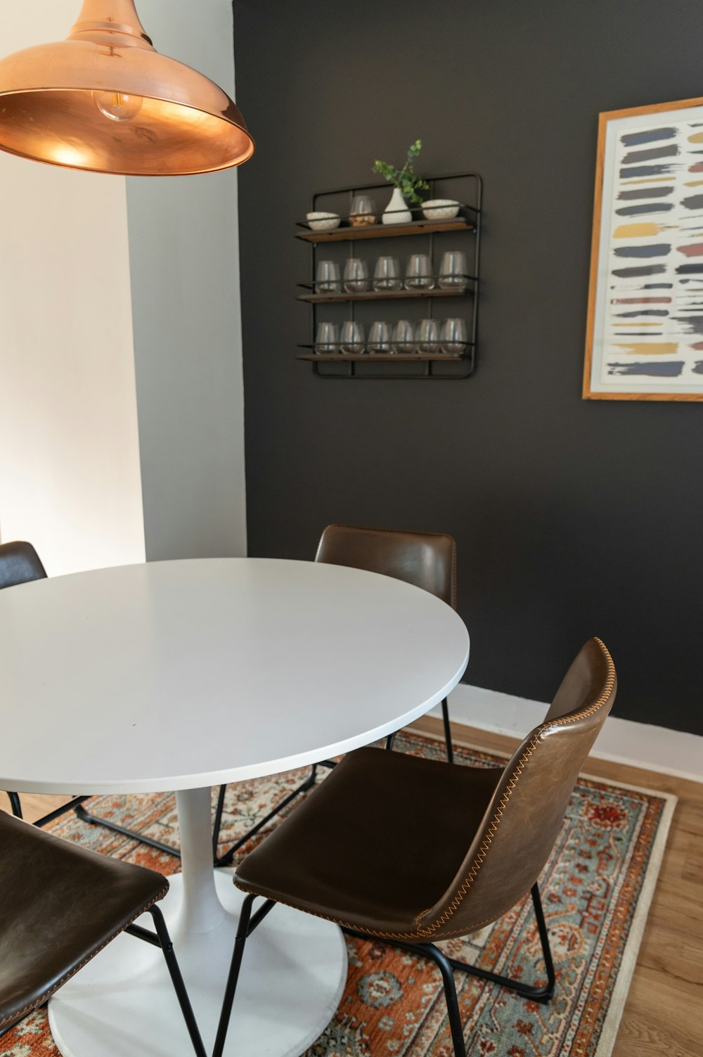 oval white wooden table with chairs