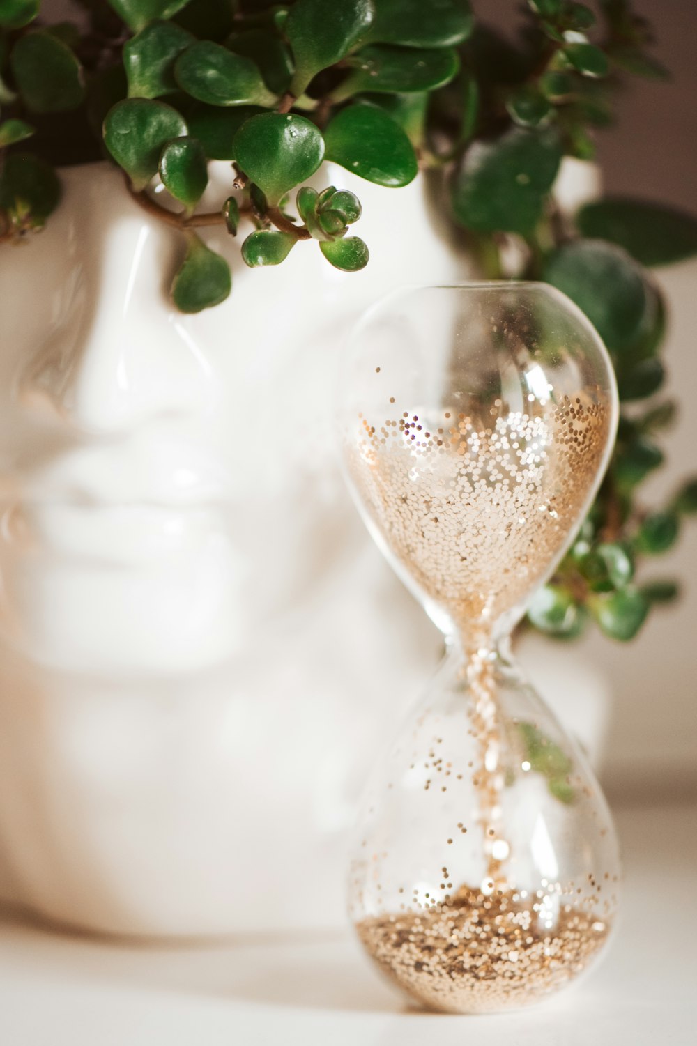 clear glass bottle with white liquid