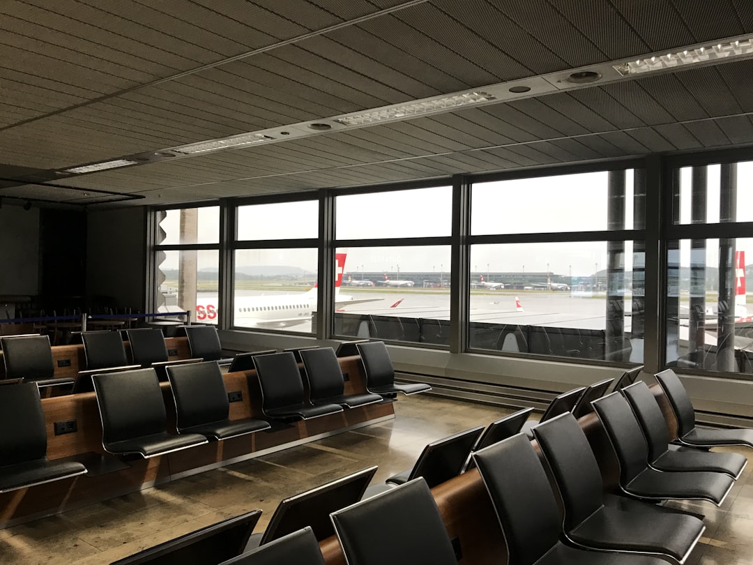 black and brown chairs inside room, Empty airport.