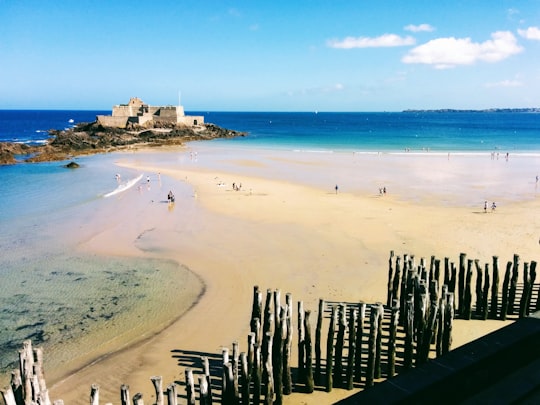 people on beach during daytime in Fort National France