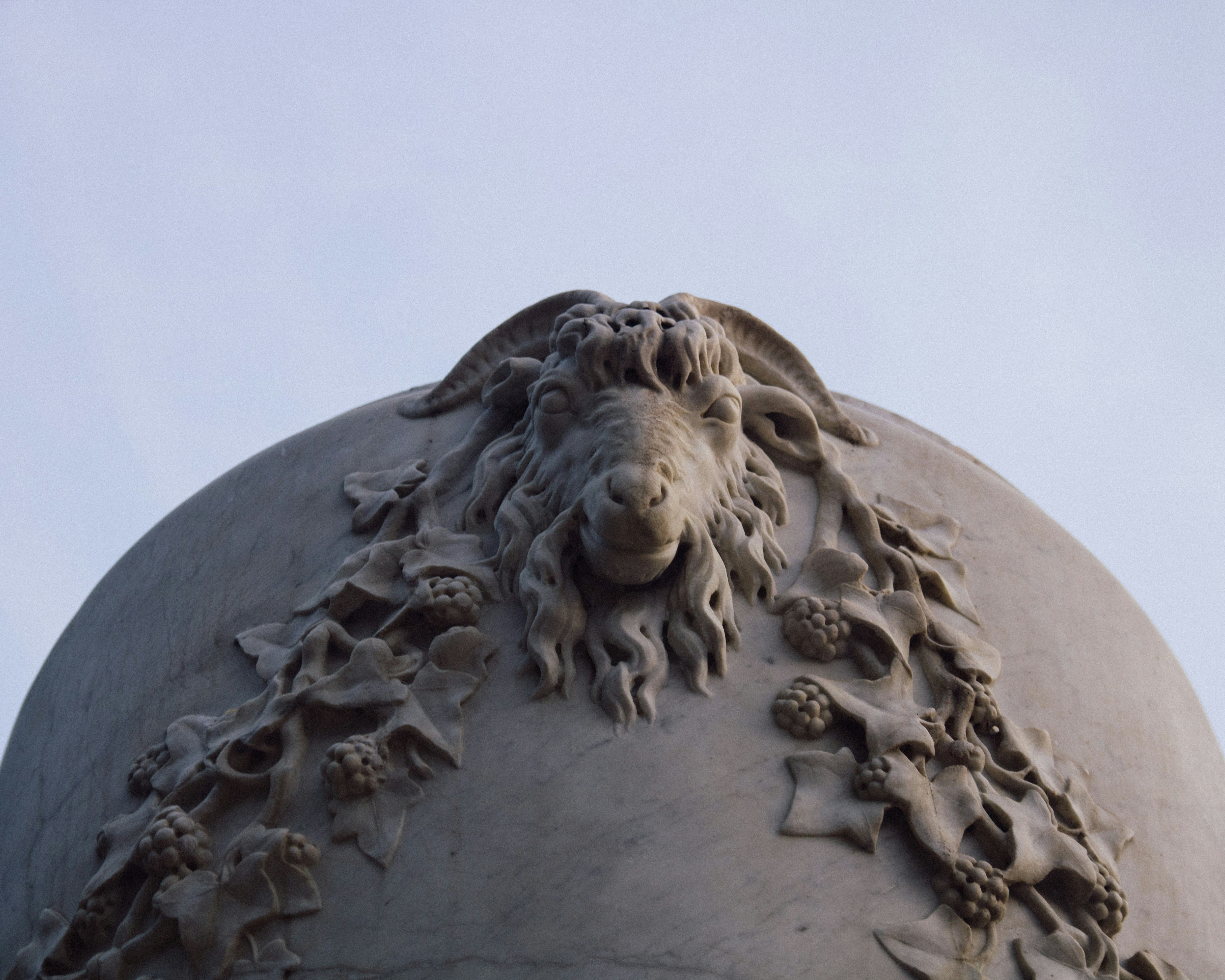 gray concrete statue under blue sky during daytime