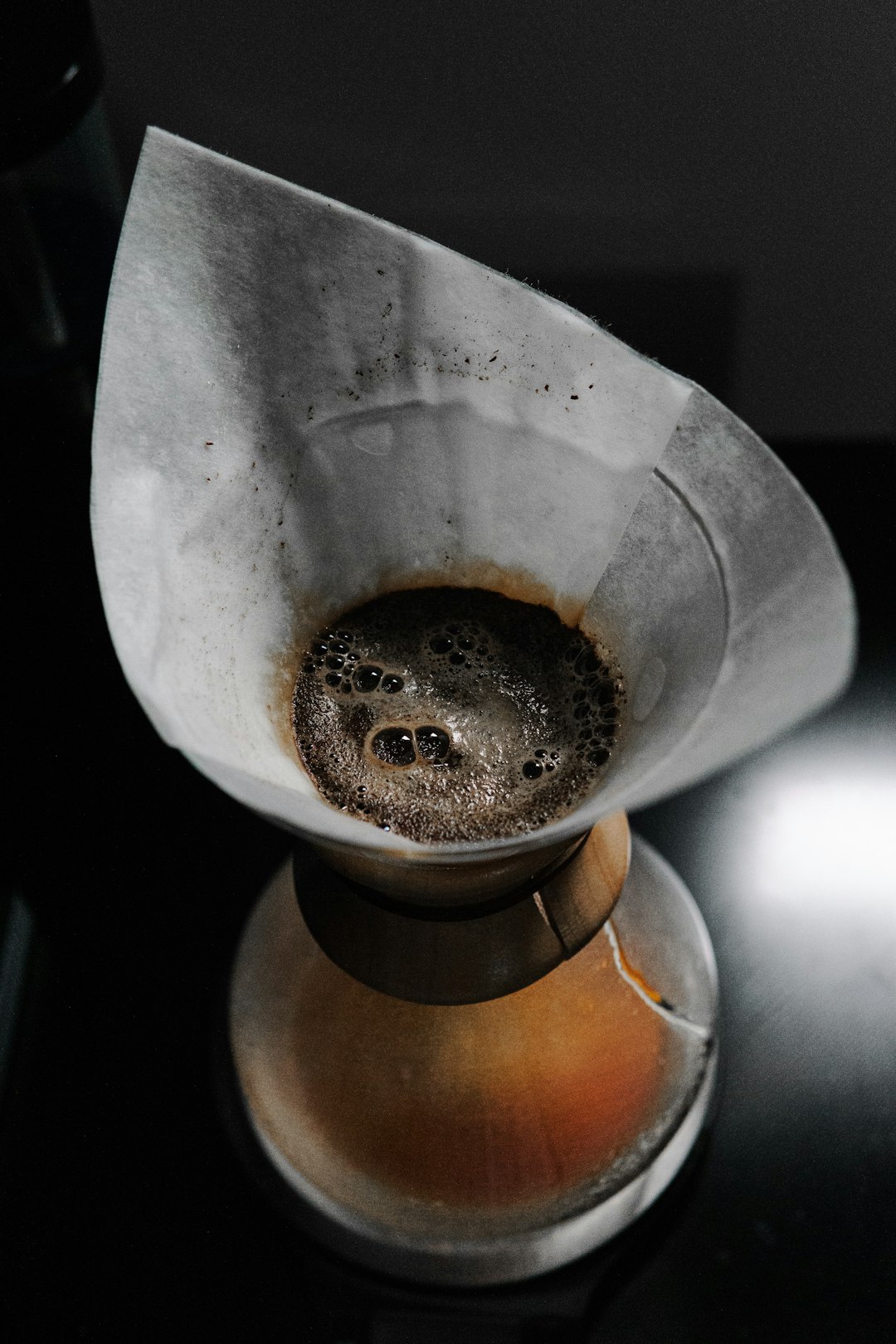 brown and silver cup with brown liquid