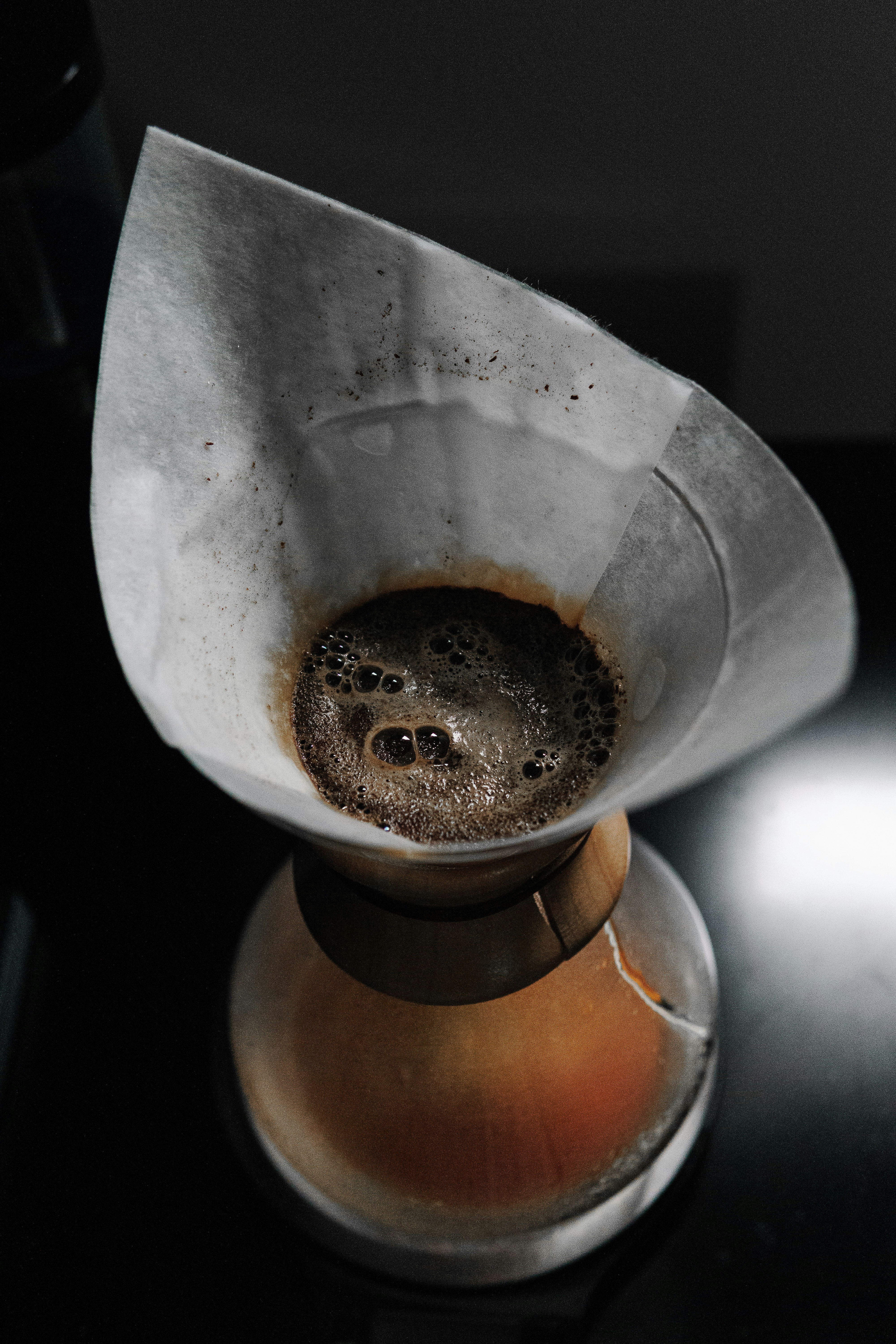 brown and silver cup with brown liquid