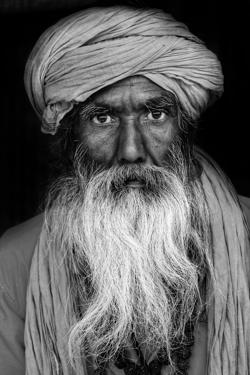 grayscale photo of woman wearing hat