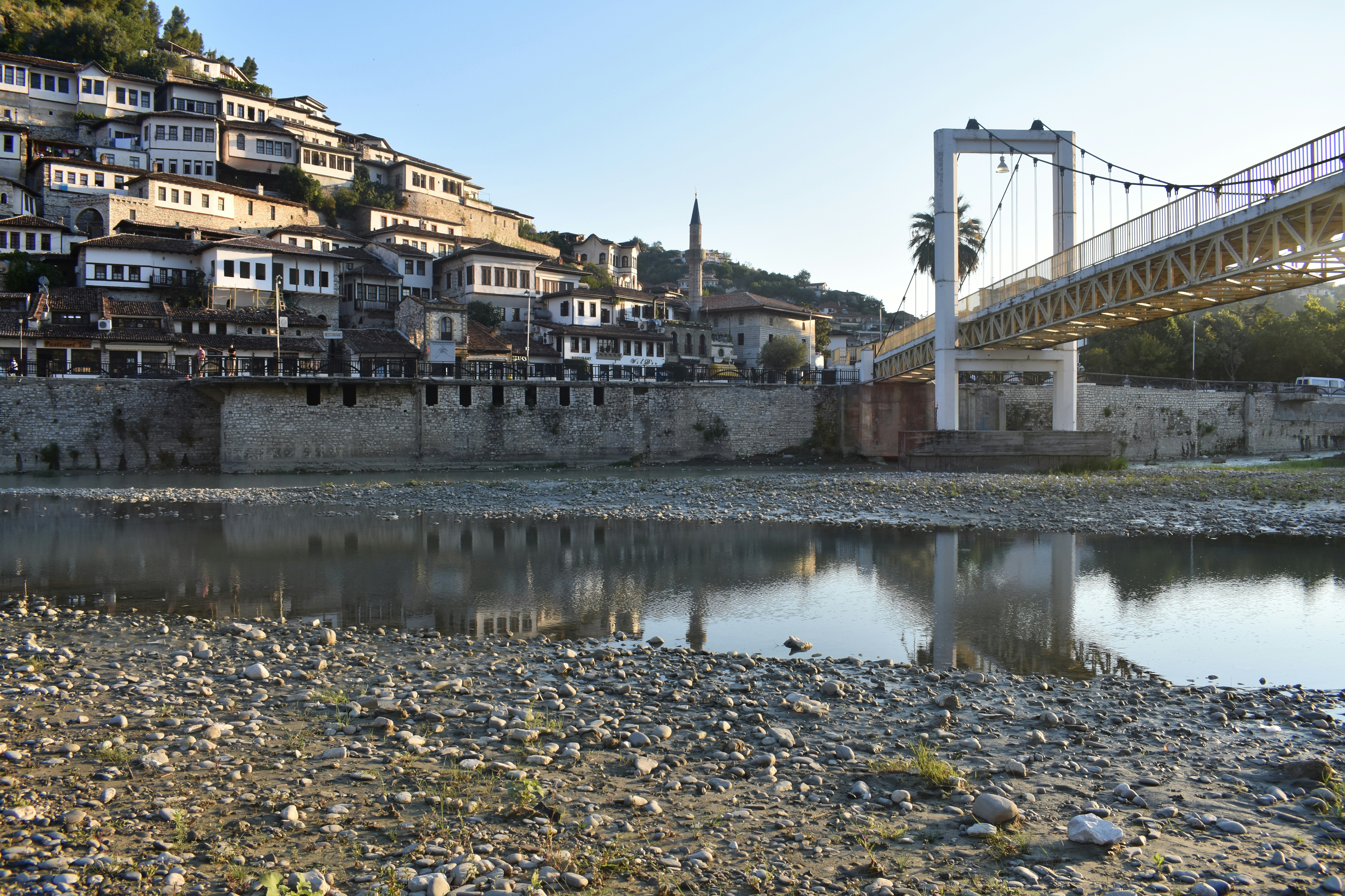 white bridge over river during daytime