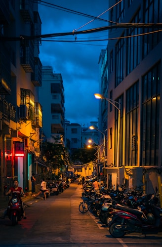 people walking on street during night time