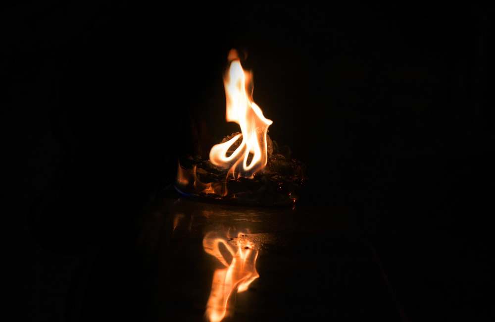 fire in black background with black background