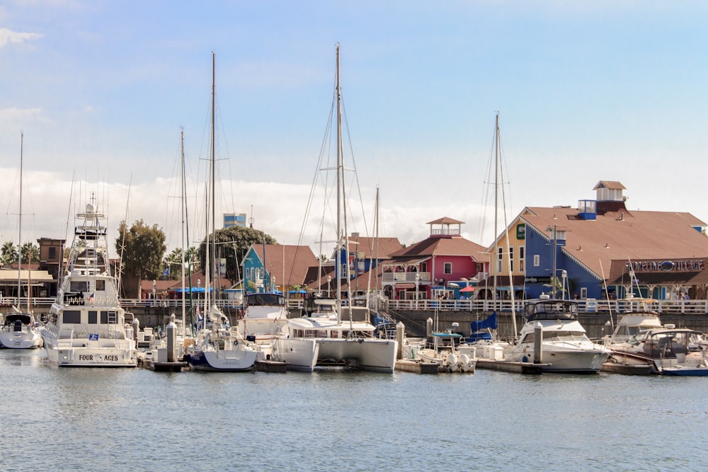 white sail boats on sea during daytime