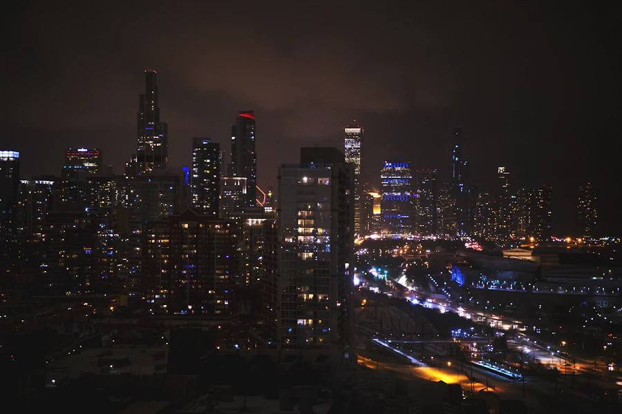 Chicago city skyline at night reflected in Lake Michigan