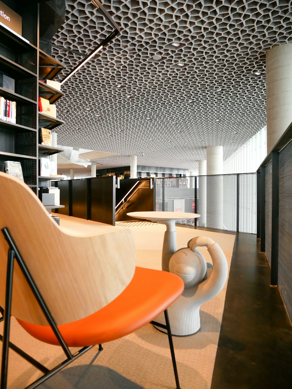 brown wooden chair near white wooden table