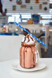chocolate ice cream on clear glass jar