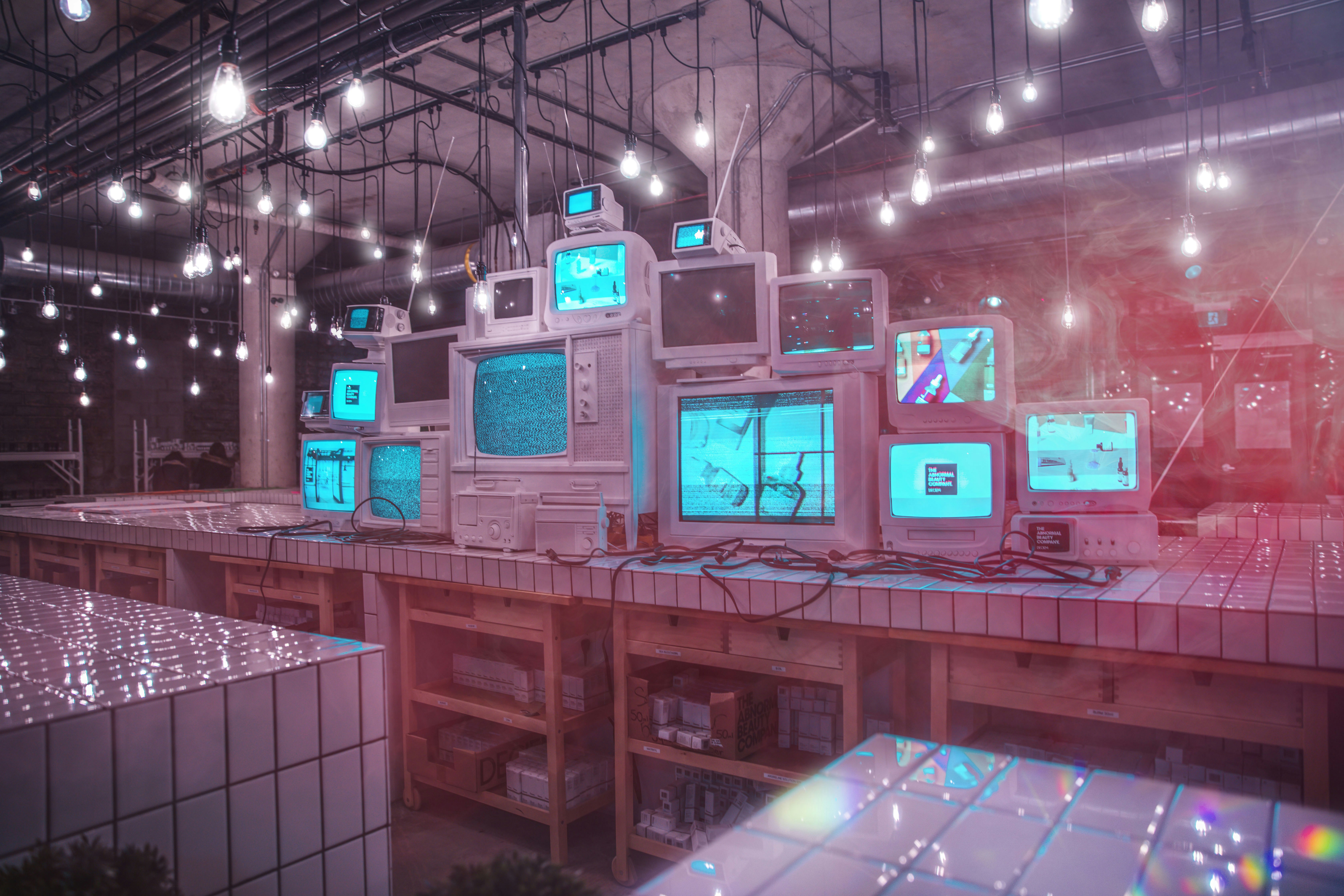lots of t.v's with a fun color of pop