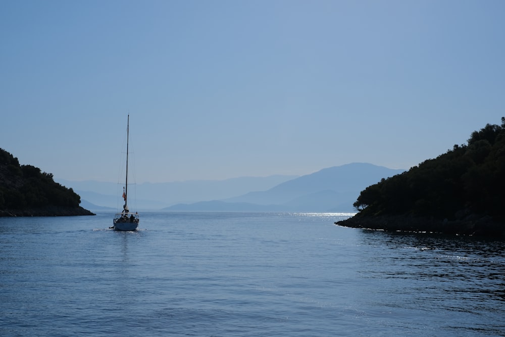 sailboat on sea during daytime