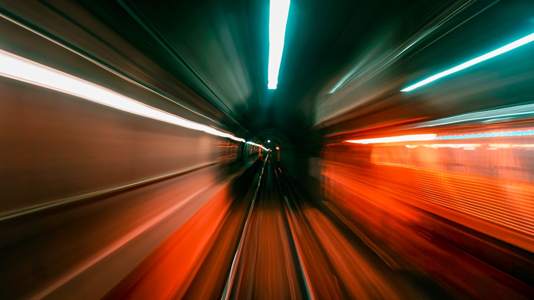 red and white light in tunnel,
