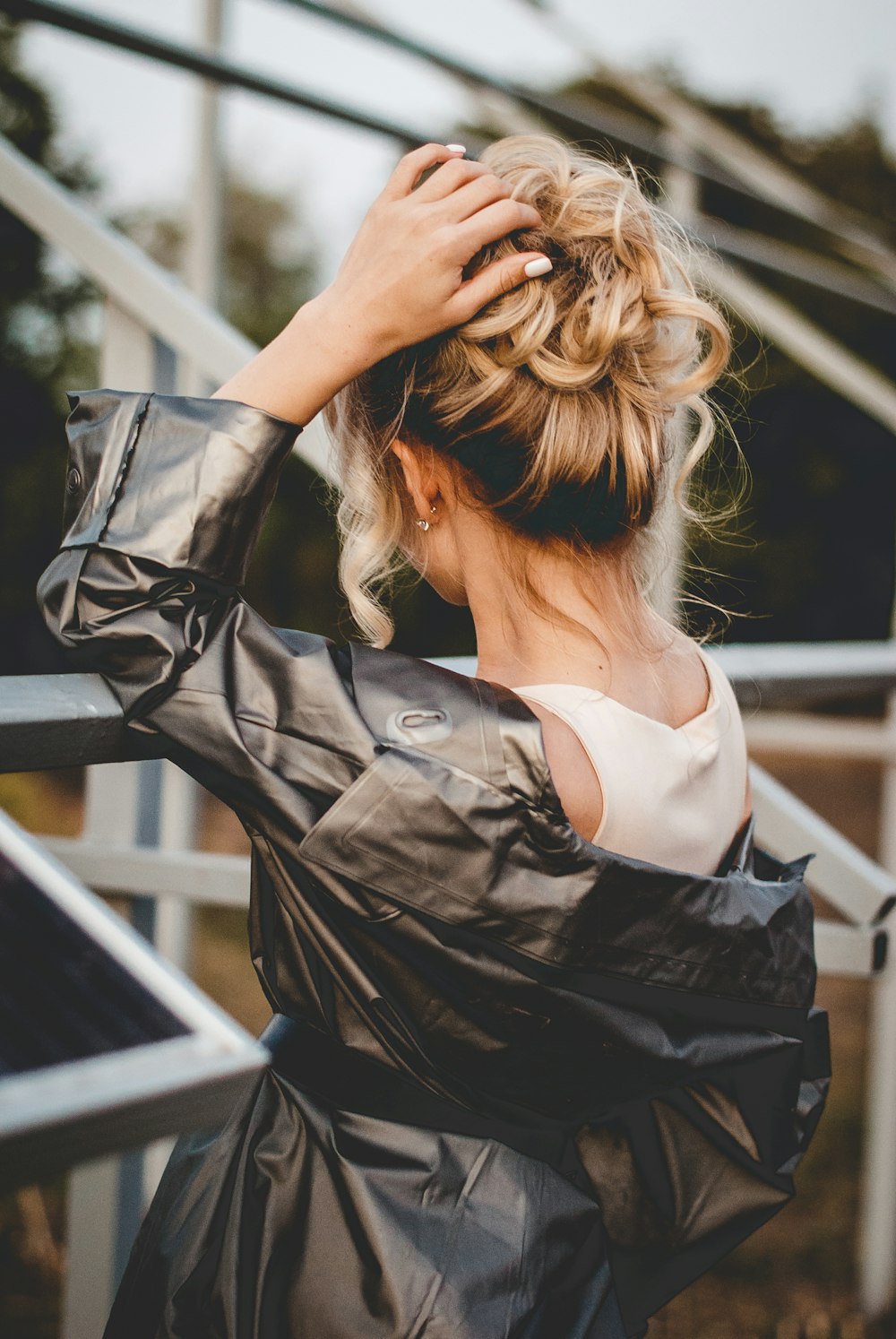 woman in black leather jacket