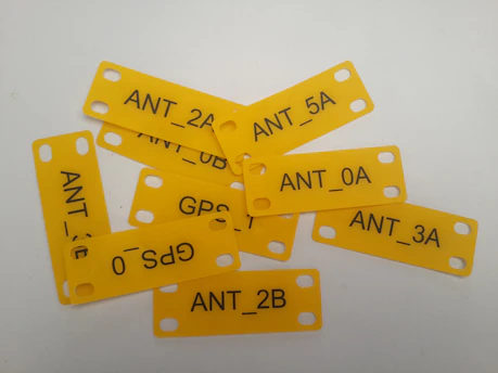 RF labels attached to various products, showcasing their versatility.