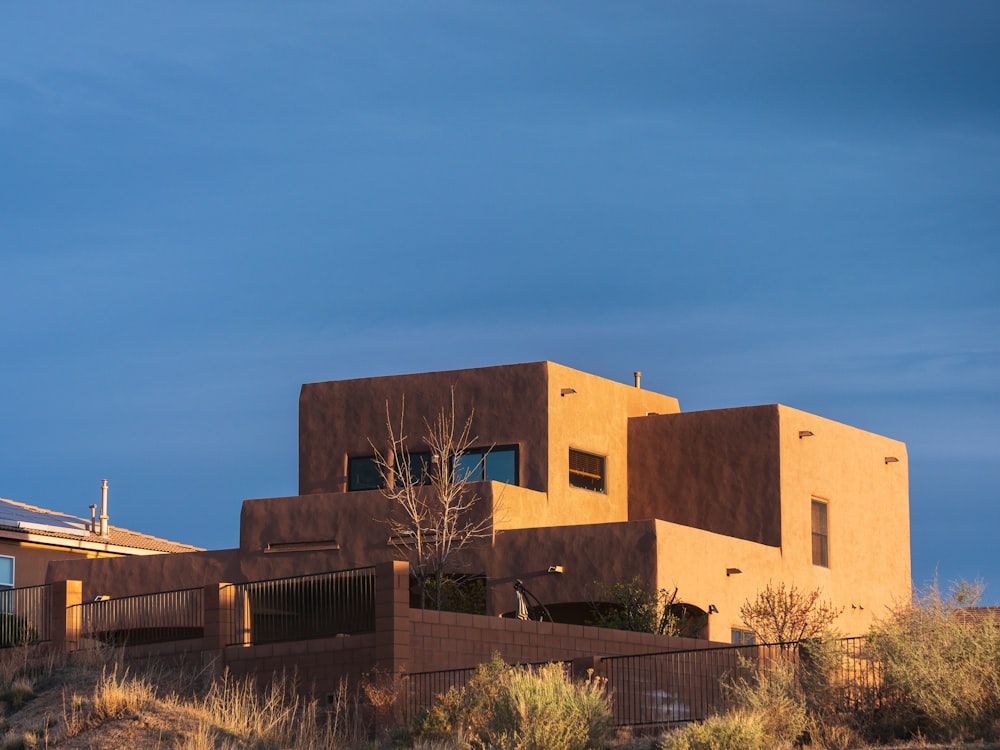 brown concrete building under blue sky during daytime