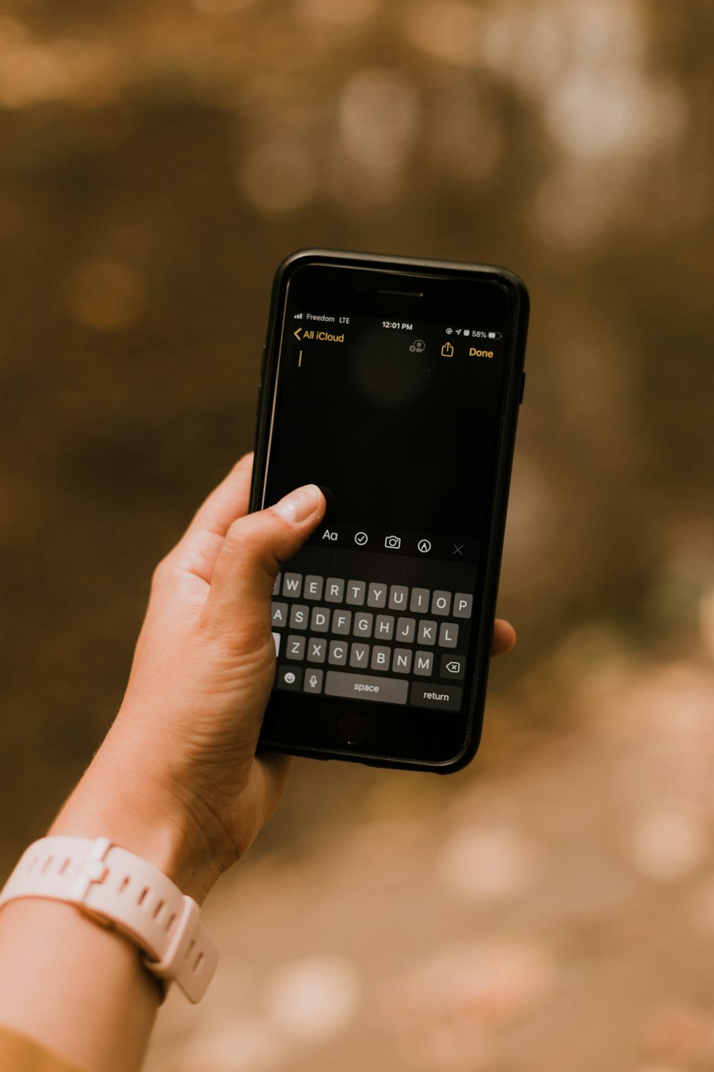 person holding black android smartphone