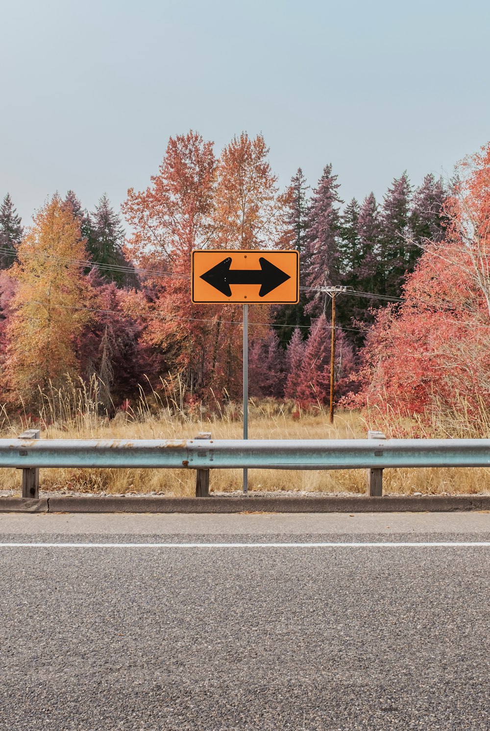 black and white arrow sign