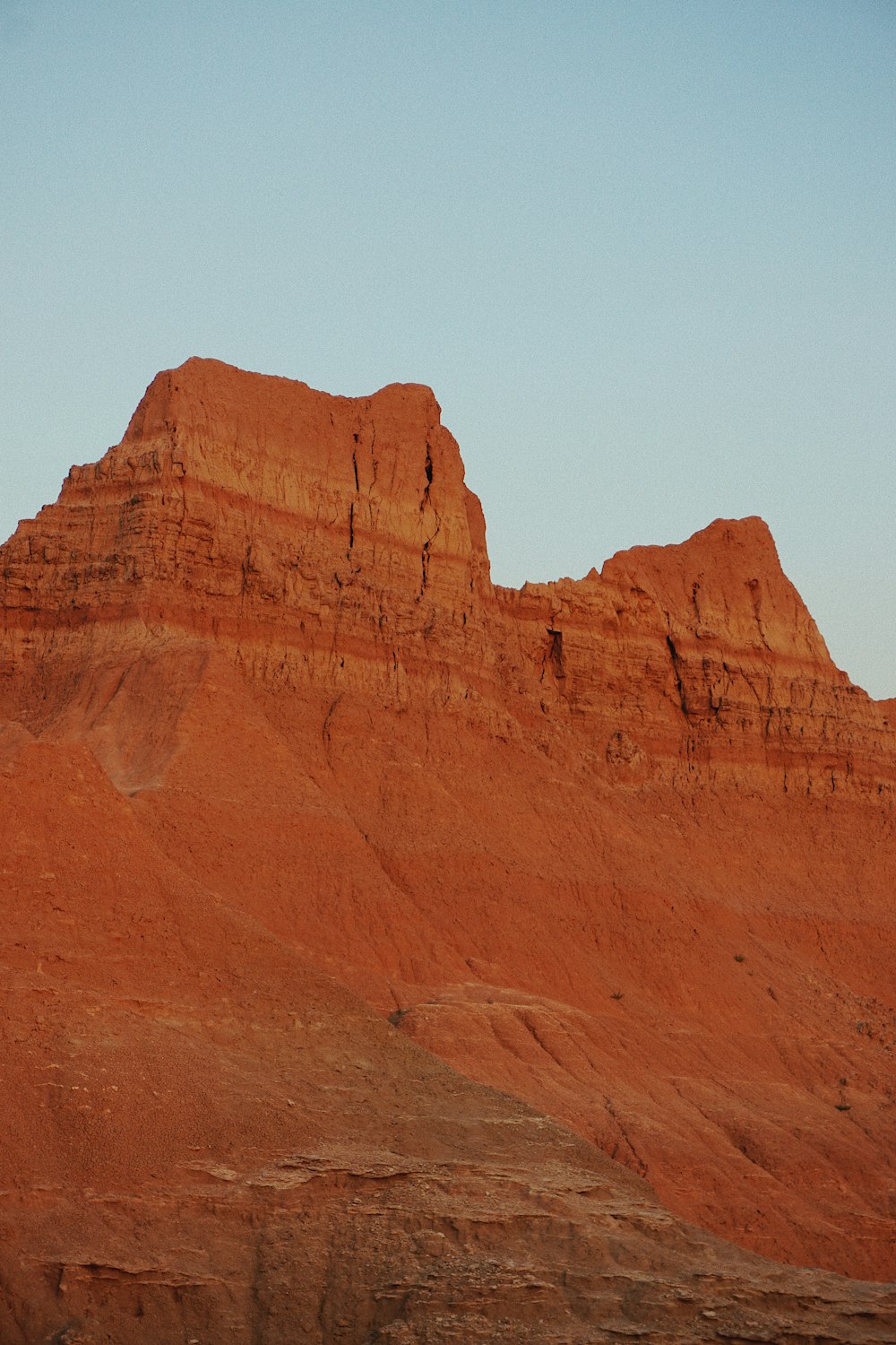 brown rock formation under blue sky during daytime