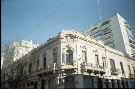 white concrete building under blue sky during daytime in Rosario Argentina