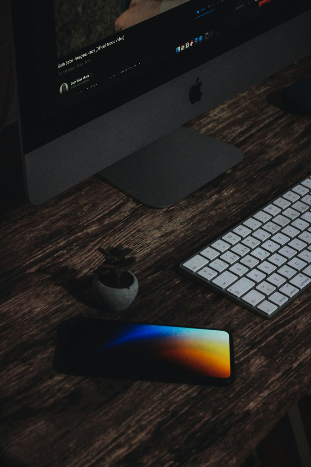 silver imac and apple keyboard