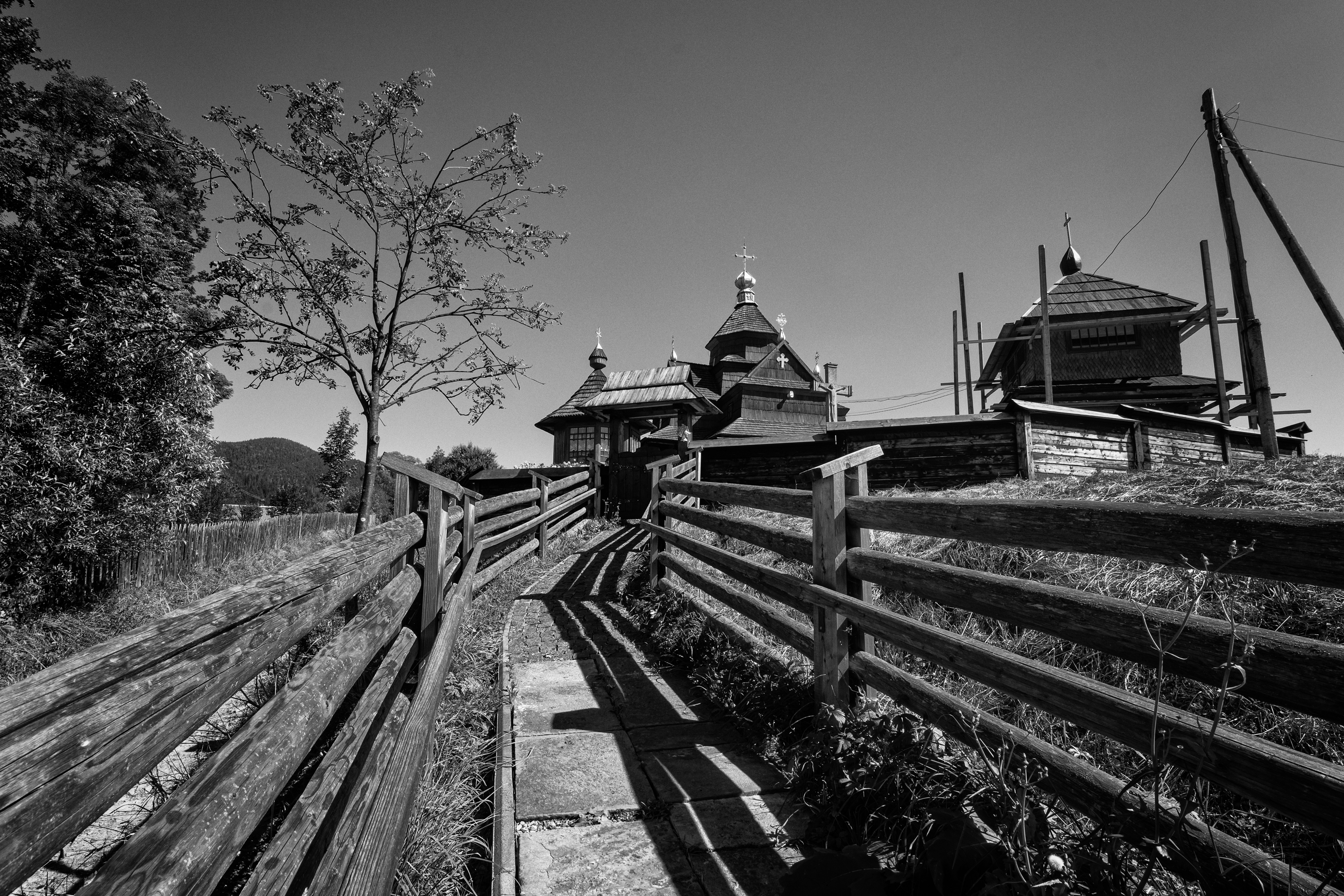 grayscale photo of train rail