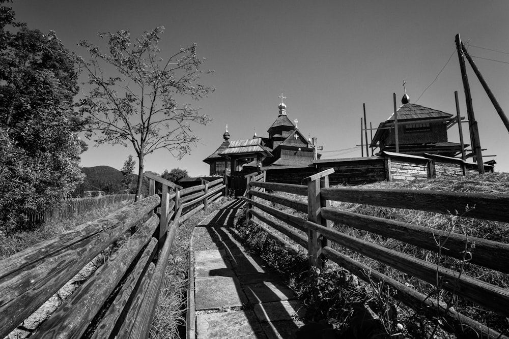 grayscale photo of train rail