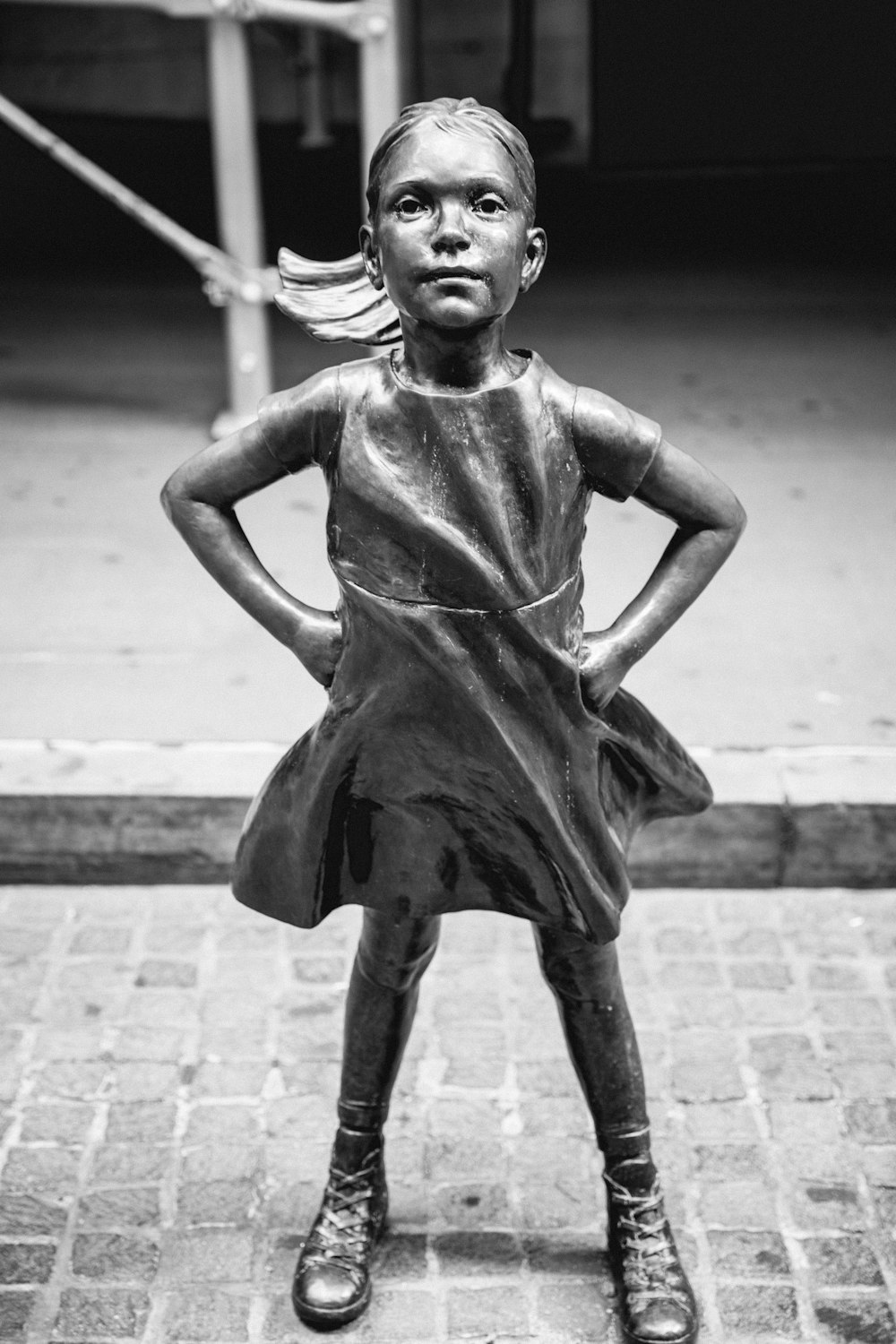 grayscale photo of girl statue