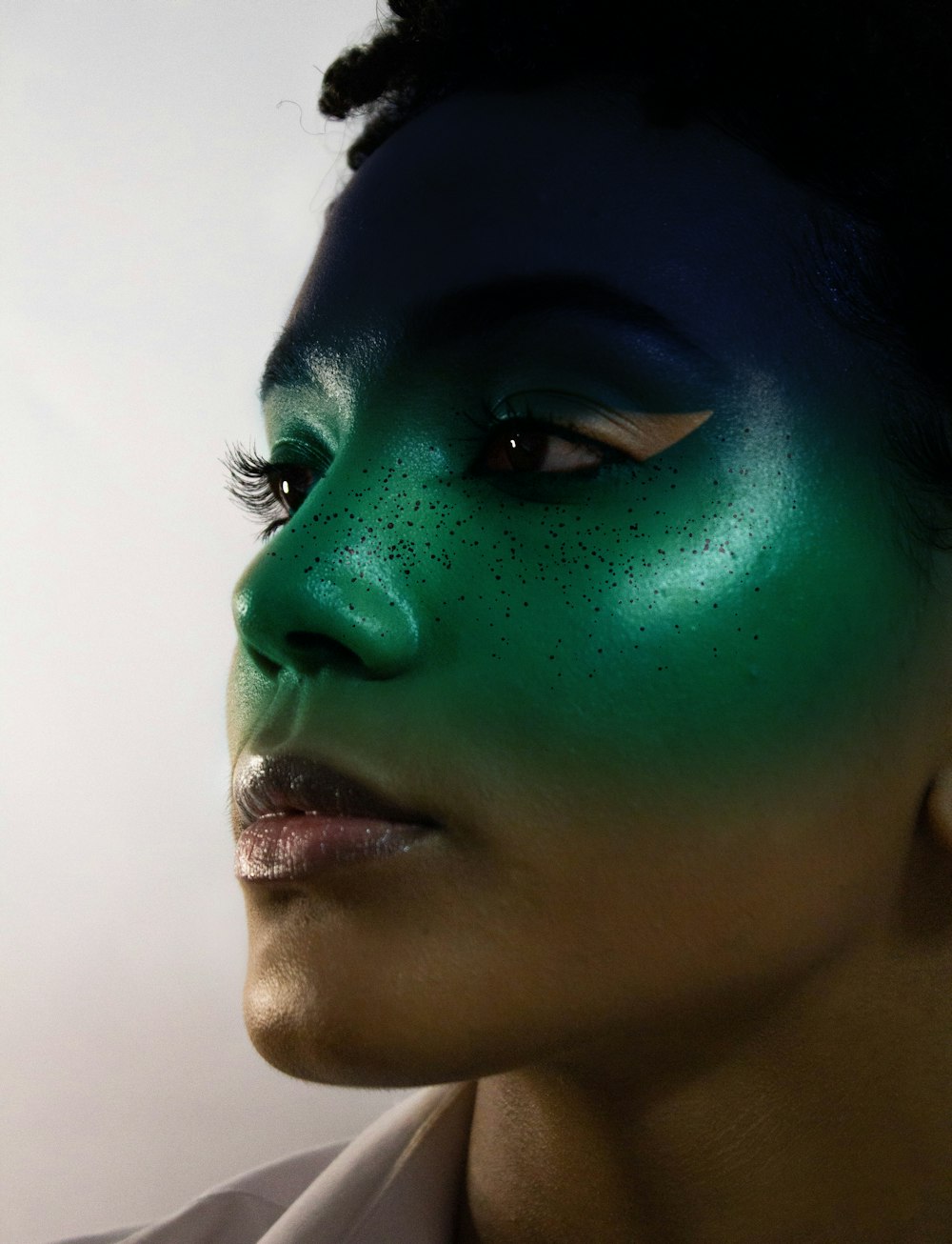 woman with green eyes and black hair