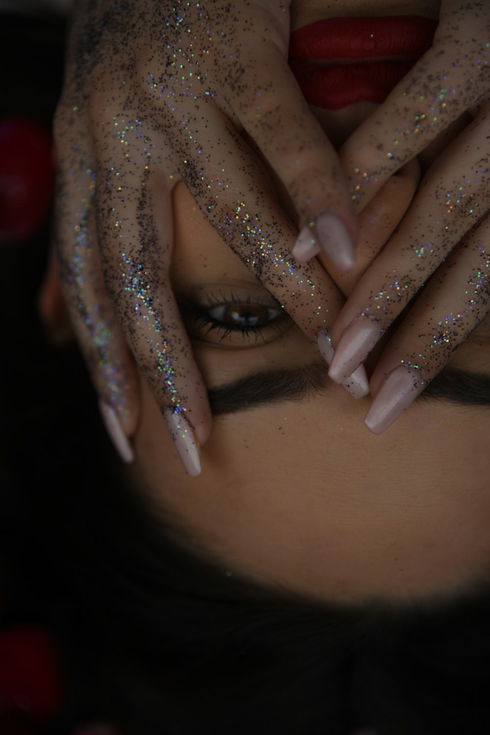 woman with blue and white manicure