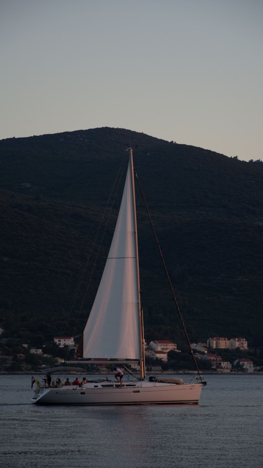 white sailboat on body of water during daytime in Pelješac Croatia