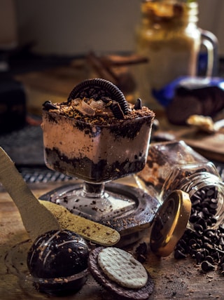 chocolate ice cream on clear glass cup