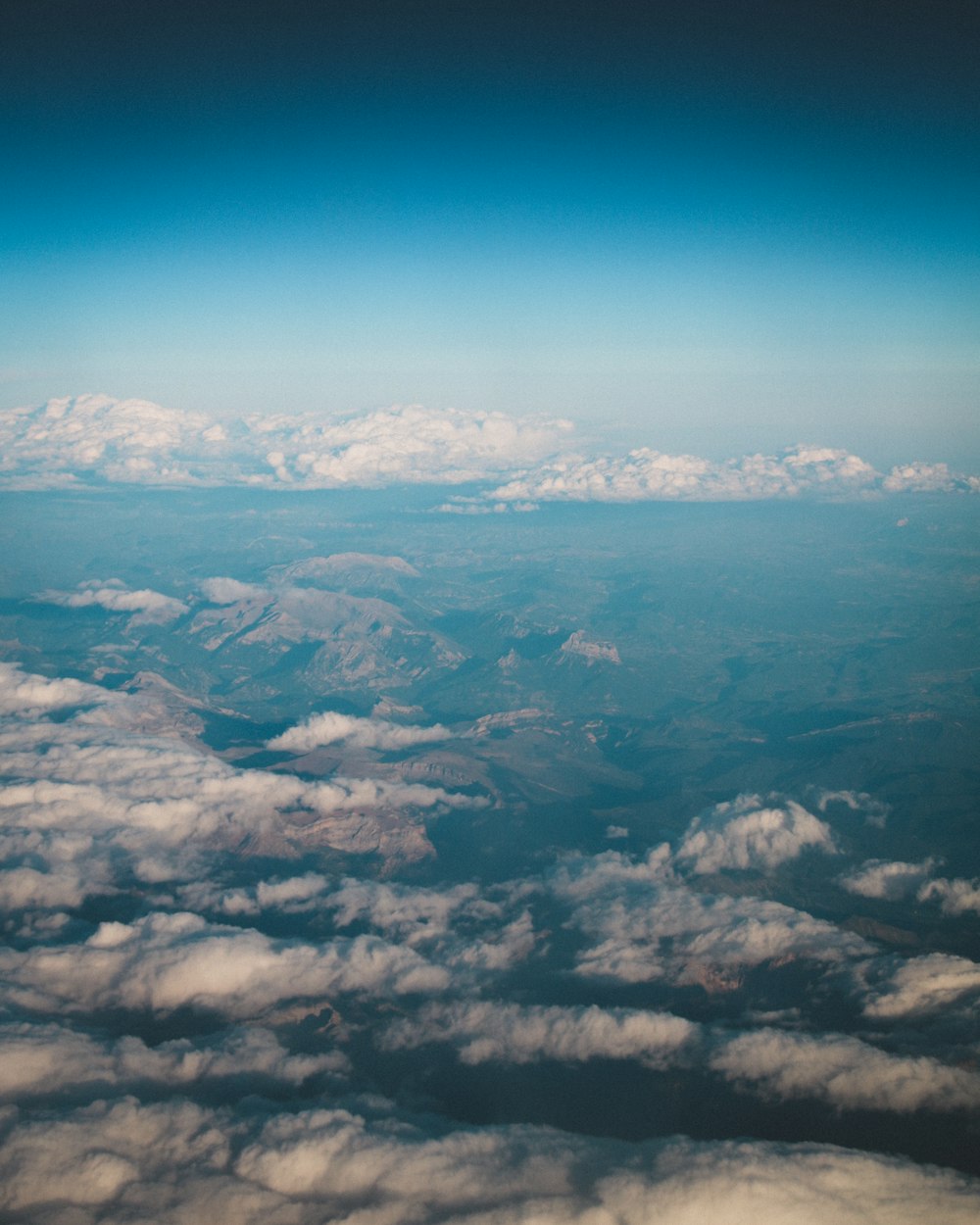 aerial view of white clouds and blue sky during daytime